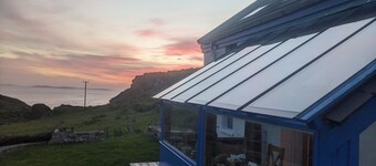 Idyllic Connemara cottage with sweeping sea, island and mountain views.