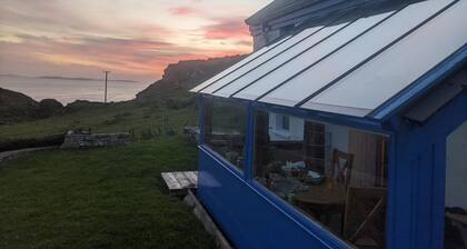 Idyllic Connemara cottage with sweeping sea, island and mountain views.
