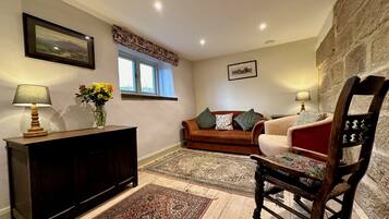 Cottage, 4 Bedrooms (The Farmhouse) | Living area | 32-inch TV with digital channels