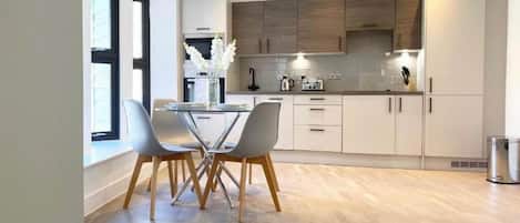 Standard Apartment | Private kitchen | Full-size fridge, microwave, oven, stovetop