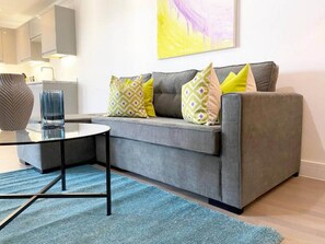Standard Apartment | Living area | 42-inch Smart TV with digital channels, Netflix, streaming services - Modern Stylish 2 bedroom 2 Bath Apts. (Rochester)