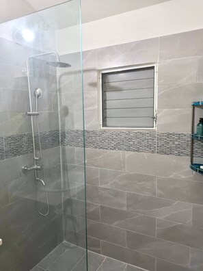 Shower, towels, soap, shampoo