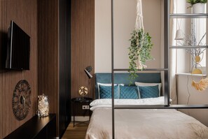 Estudi en suite de disseny | 1 dormitori, planxa i posts de planxar, wifi gratuïta i roba de llit 