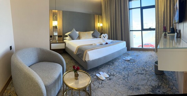 Suite Junior | 1 camera, una cassaforte in camera, ferro/asse da stiro, Wi-Fi gratuito