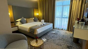 Junior suite | 1 slaapkamer, een kluis op de kamer, een strijkplank/strijkijzer