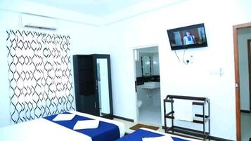 Chambre Triple Deluxe, vue plage | Salle de bain