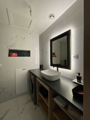 Hair dryer, towels, soap, shampoo