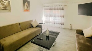 Apartamento familiar | 1 dormitorio, cortinas opacas, tabla de planchar con plancha