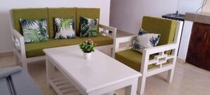 Appartement Deluxe | Coin séjour | Télévision à écran plat