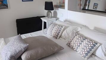 4 bedrooms, desk, iron/ironing board, travel cot