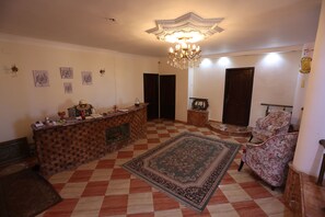 Deluxe Twin Room, 1 Double Bed, Balcony | Living area | 1-inch TV with premium TV channels, fireplace, pay films