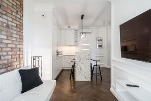 City Apartment | Living room | 37-inch flat-screen TV with digital channels