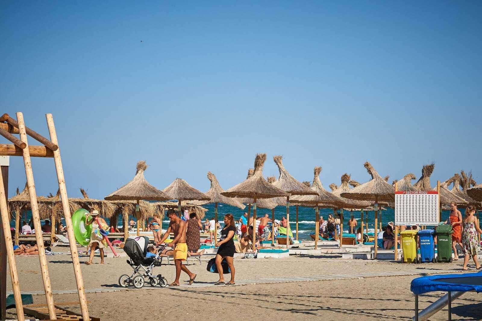 Private beach, white sand, sun loungers, beach umbrellas