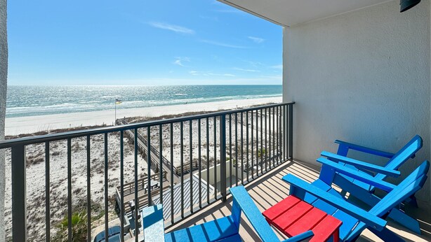 A balcony with a view of the beach and ocean. - HEART OF GULF SHORES, GULF-FRONT BALCONY, POOL! | BEACHBALL PROPERTIES (Gulf Shores)