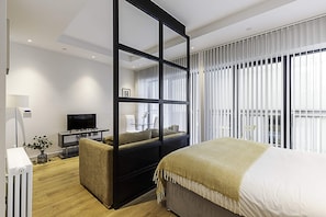 Departamento básico | 1 habitación, tabla de planchar con plancha y ropa de cama