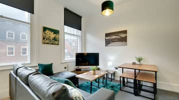 Apartamento | Área de estar | Smart TV 50 polegadas com canais digitais