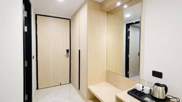 Executive Room | Blackout curtains, iron/ironing board, free WiFi