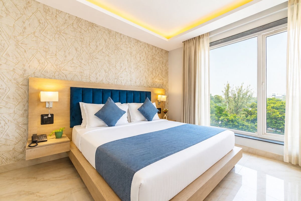 Executive Room | Blackout curtains, iron/ironing board (on request), free WiFi