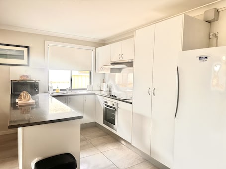 Fridge, microwave, oven, stovetop. Newcasle 6 bedrooms home