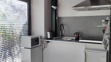 Fridge, microwave, stovetop, coffee/tea maker