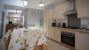 Coffee/tea maker, fridge, microwave, oven