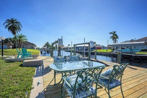Outdoor dining - New! Gulf Breeze Haven: Pet Friendly | Heated Pool & Spa | Gulf Access (Cape Coral)