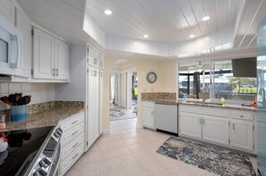 Fridge, microwave, oven, stovetop - New! Gulf Breeze Haven: Pet Friendly | Heated Pool & Spa | Gulf Access (Cape Coral)