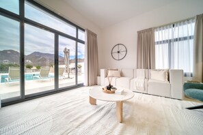 TV - Beautiful 3BR Villa with Assistant Room Al Dana Island, Fujairah by Deluxe Holiday Homes (Fujairah)