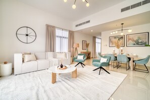 TV - Beautiful 3BR Villa with Assistant Room Al Dana Island, Fujairah by Deluxe Holiday Homes (Fujairah)