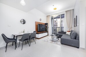 TV - Beautiful 1BR at Forte Tower 2 Downtown Dubai by Deluxe Holiday Homes (Dubai)