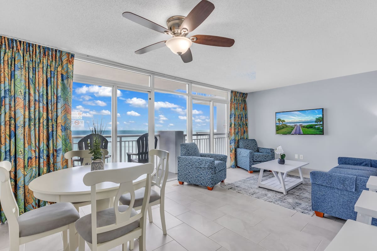 Signature Condo, Balcony, Oceanfront | Living room