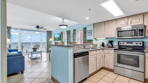 A modern kitchen with a dishwasher, double oven, and microwave. - Atlantica Resort Myrtle Beach (Myrtle Beach)