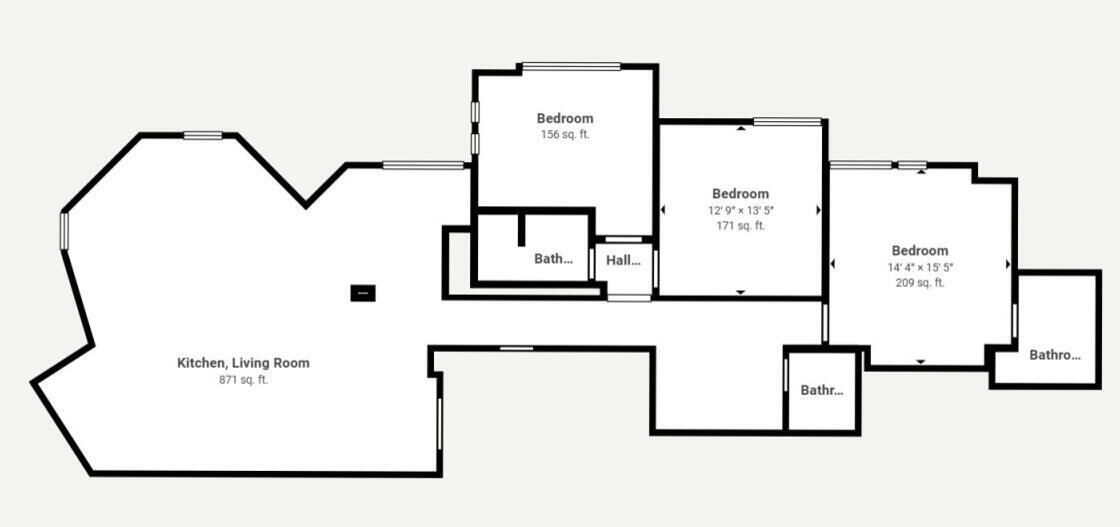 A floor plan with a kitchen, living room, three bedrooms, and two bathrooms.