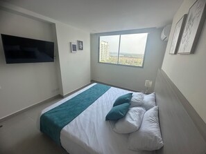 2 habitaciones, tabla de planchar con plancha, cuna de viaje y wifi 