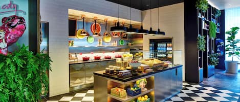 Daily buffet breakfast (USD 23 per person)
