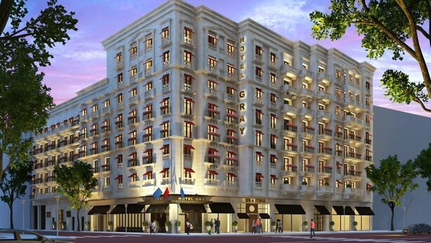 A multi-story hotel with a classic architectural style, featuring balconies and a central entrance. - Gray Hotel Casablanca (Casablanca)