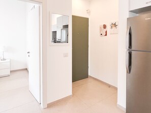 Comfort Apartment | Private kitchen | Full-size fridge, microwave, oven, stovetop