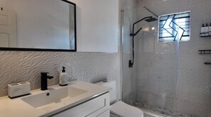 Shower, hair dryer, towels, soap