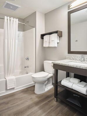 Combined shower/bathtub, hair dryer, towels, soap