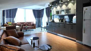 Penthouse | Coin séjour | Télévision LCD de 30 pouces avec chaßnes par cùble, chauffage par le sol