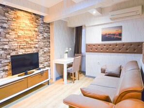 Standard Suite | Living area | 30-inch LCD TV with cable channels, heated floors - Taksim By Aydın Suite Hotel (Istanbul)