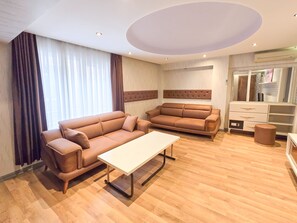 Family Suite | Living area | 30-inch LCD TV with cable channels - Taksim By Aydın Suite Hotel (Istanbul)