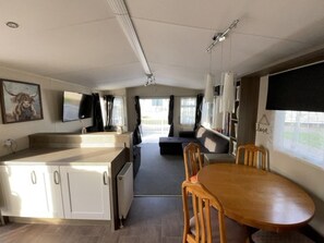 Cabin | Dining - Premium 2 bed Caravan Sleeps 6 With Huge Decking (Clacton-on-Sea)