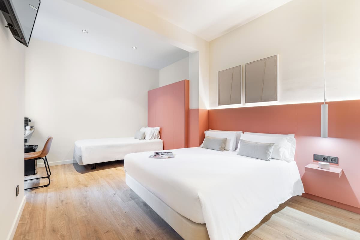 Family Room | 1 bedroom, memory-foam beds, minibar, in-room safe