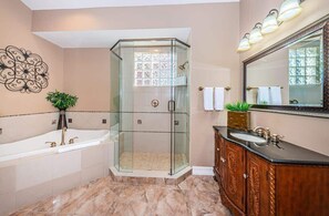 Shower, hair dryer, towels, shampoo