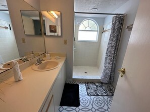 Hair dryer, towels, soap, shampoo