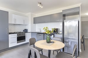 Fridge, microwave, oven, stovetop - The Terraces 330 - One Bedroom Apartment, Sleeps 2 (Cape Town)