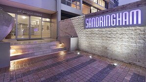 A modern building with a sign reading "37 Beach Road" and "Sandringham." - Sandringham 55 - Studio Apartment, Sleeps 2 (Cape Town)