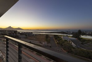 Experience breathtaking views of the coastline and surrounding mountains from this serene retreat.