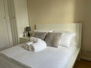 Departamento | 1 habitación, tabla de planchar con plancha, wifi gratis y ropa de cama 